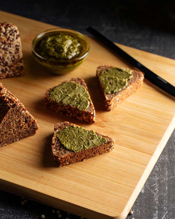 Side view on sliced flourless diet grain breadの写真素材