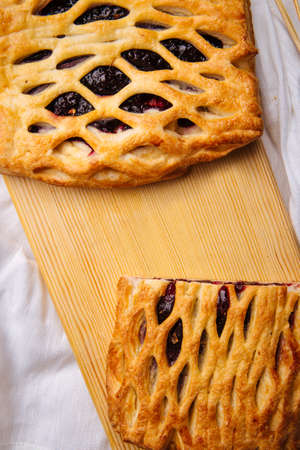 Top view on fresh baked berry jam piesの写真素材