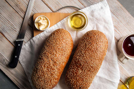 Top view on loafs of wheat and rye flour bread