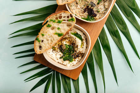 Mazeh appetizers set with hummus and other dips