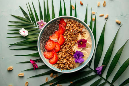 Granola yogurt with chia seeds and strawberriesの写真素材