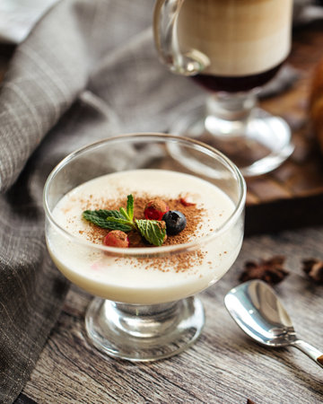 Cream mousse dessert with berries and cocoaの写真素材