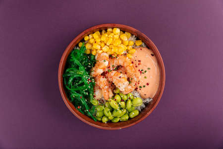 Hawaiian shrimp poke bowl with vegetablesの写真素材