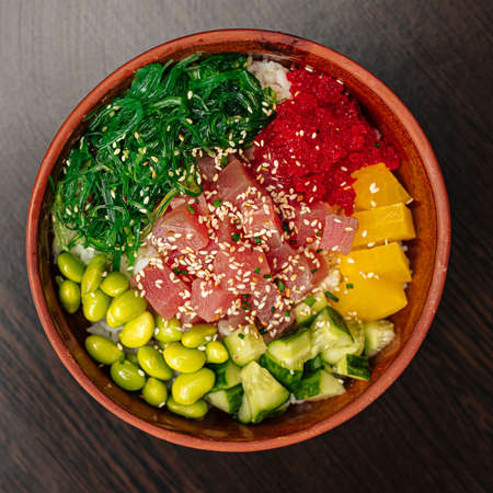 Hawaiian tuna poke bowl with vegetablesの写真素材