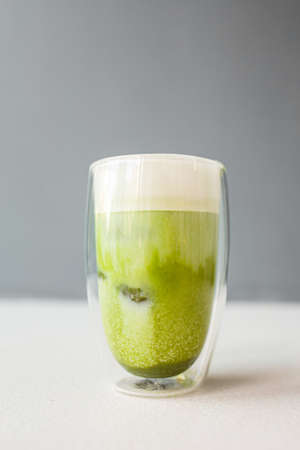 Matcha green tea with ice cubesの写真素材