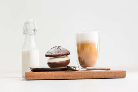 Coffee latte with whoopie pie cream dessert