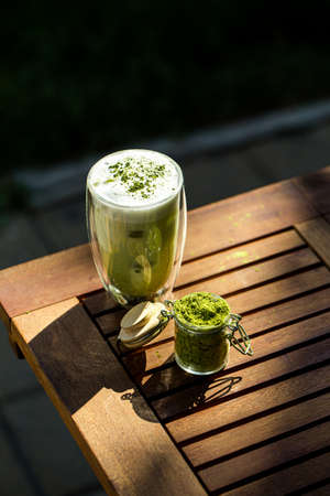 Matcha green tea with ice cubesの写真素材