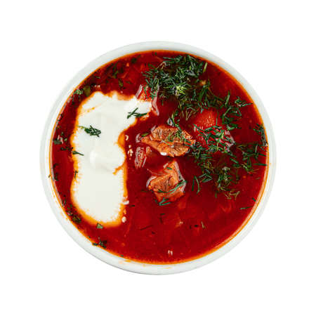 Isolated beet root soup borscht with sour creamの写真素材