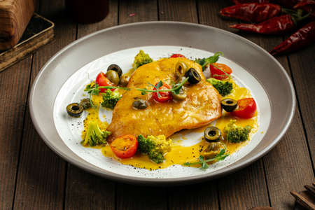 Cooked chicken fillet in cream cheese sauce