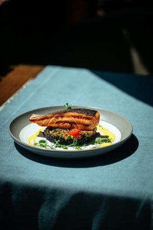 Salmon with creamy basil sauce and black rice