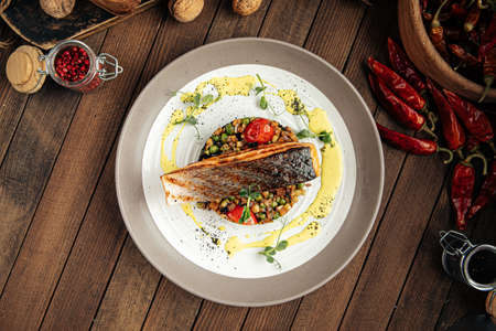 Salmon with creamy basil sauce and black rice