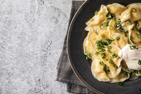 Russian vareniki dumplings with sour creamの写真素材