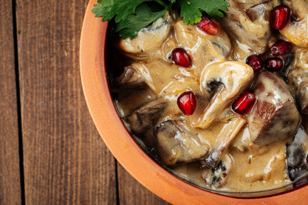 Georgian with liver and mushrooms in a clay potの写真素材