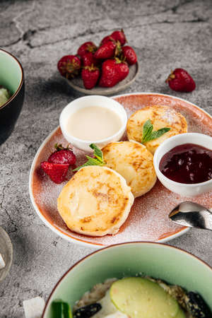 Delicious cottage cheese pancakes syrnikiの写真素材