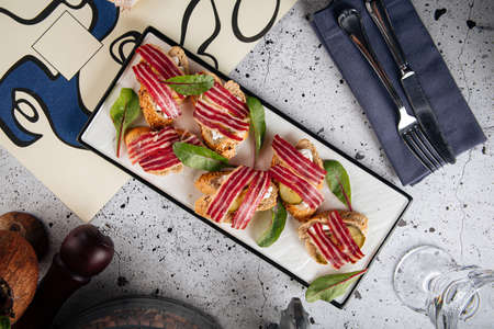 Gourmet bacon bruschetta appetizer dish