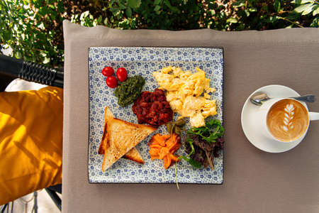 Served rustic breakfast with cappuccino coffee