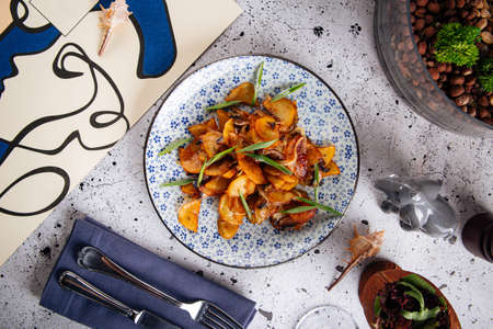 Portion of rustic fried potatoes dish