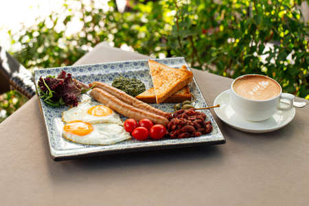 Served english breakfast with cappuccino coffee