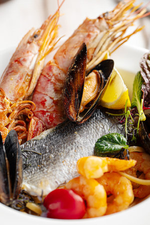 Assorted seafood set dish in white plateの写真素材