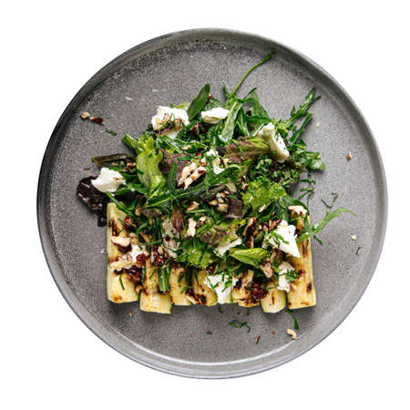 Baked zucchini with nuts and feta cheese salad