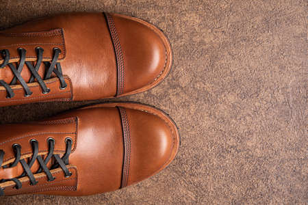Handcrafted brown leather bootsの写真素材