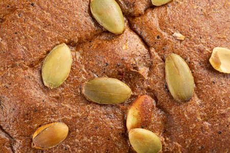 Closeup on pumpkin seeds bread texture