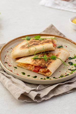 Portion of appetizer quesadilla with chickenの写真素材