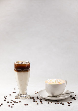 Two drinks cappuccino and iced coffee