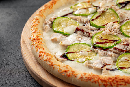 Chicken pizza with zucchini and balsamic sauceの写真素材
