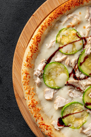 Chicken pizza with zucchini and balsamic sauceの写真素材