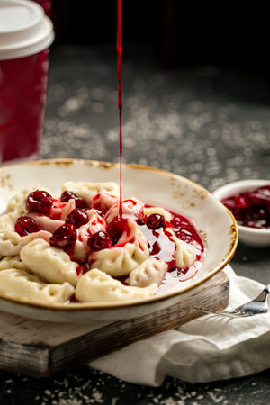 Portion of russian dumplings vareniki with cherryの写真素材