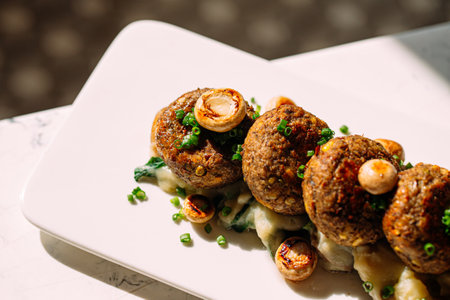 Portion of vegetarian falafels with mushroomsの写真素材