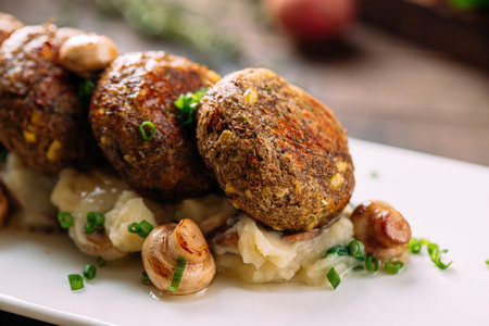 Portion of vegetarian falafels with mushroomsの写真素材