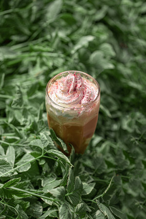 Portion of sweet coffee frappe with whipped creamの写真素材