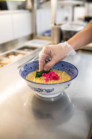 Chef making japanese ramen noodle soupの写真素材