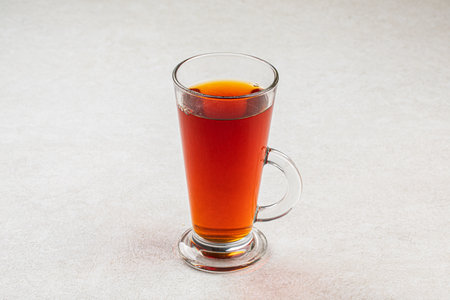 Glass mug of black teaの写真素材
