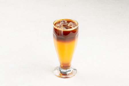 Glass of bumble coffee drink with orange juiceの写真素材