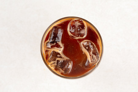 Glass of bumble coffee drink with orange juiceの写真素材