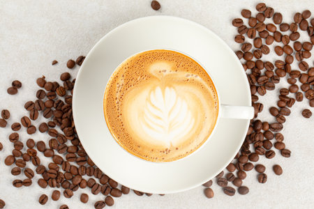 White cup of fresh cappuccino coffeeの写真素材