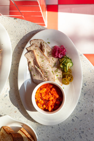 Portion of chicken with beansの写真素材