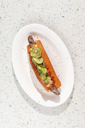 Closeup on hotdog with cucumber and jalapenoの写真素材