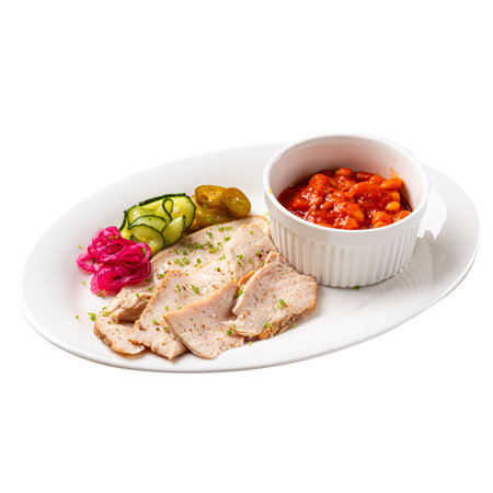 Portion of chicken with beans and picklesの写真素材