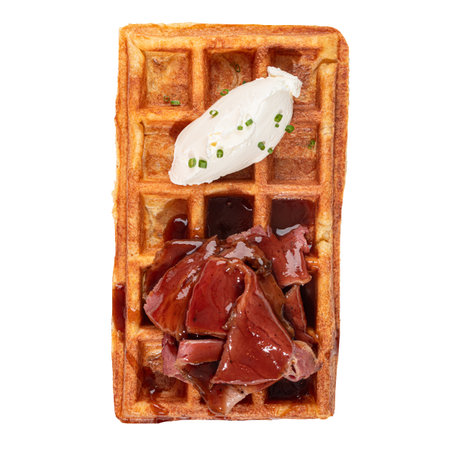 Portion of waffle with brisket and cream cheeseの写真素材