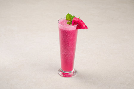 Glass of dragon fruit pitahaya smoothie with mintの写真素材