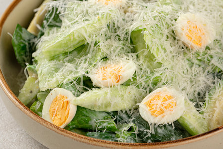 Portion of healthy avocado green saladの写真素材