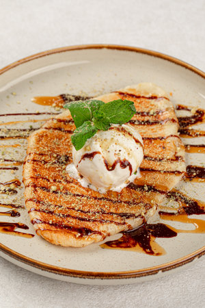 Sweet flat pastry with ice creamの写真素材