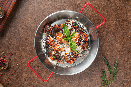 Portion of wild rice risotto with seafoodの写真素材