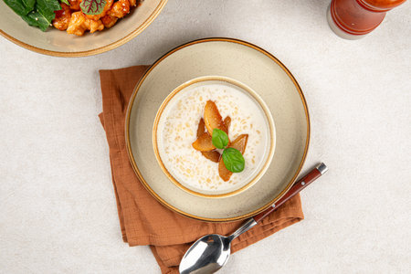 Portion of breakfast porridge cereals with peachの写真素材