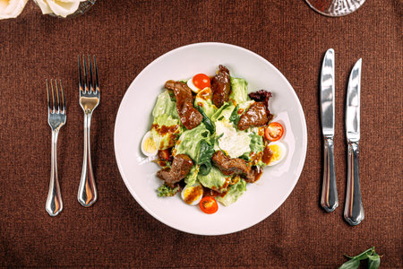 Portion of salad with meat and teriyaki sauceの写真素材