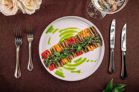 Portion of restaurant baked pepper appetizerの写真素材